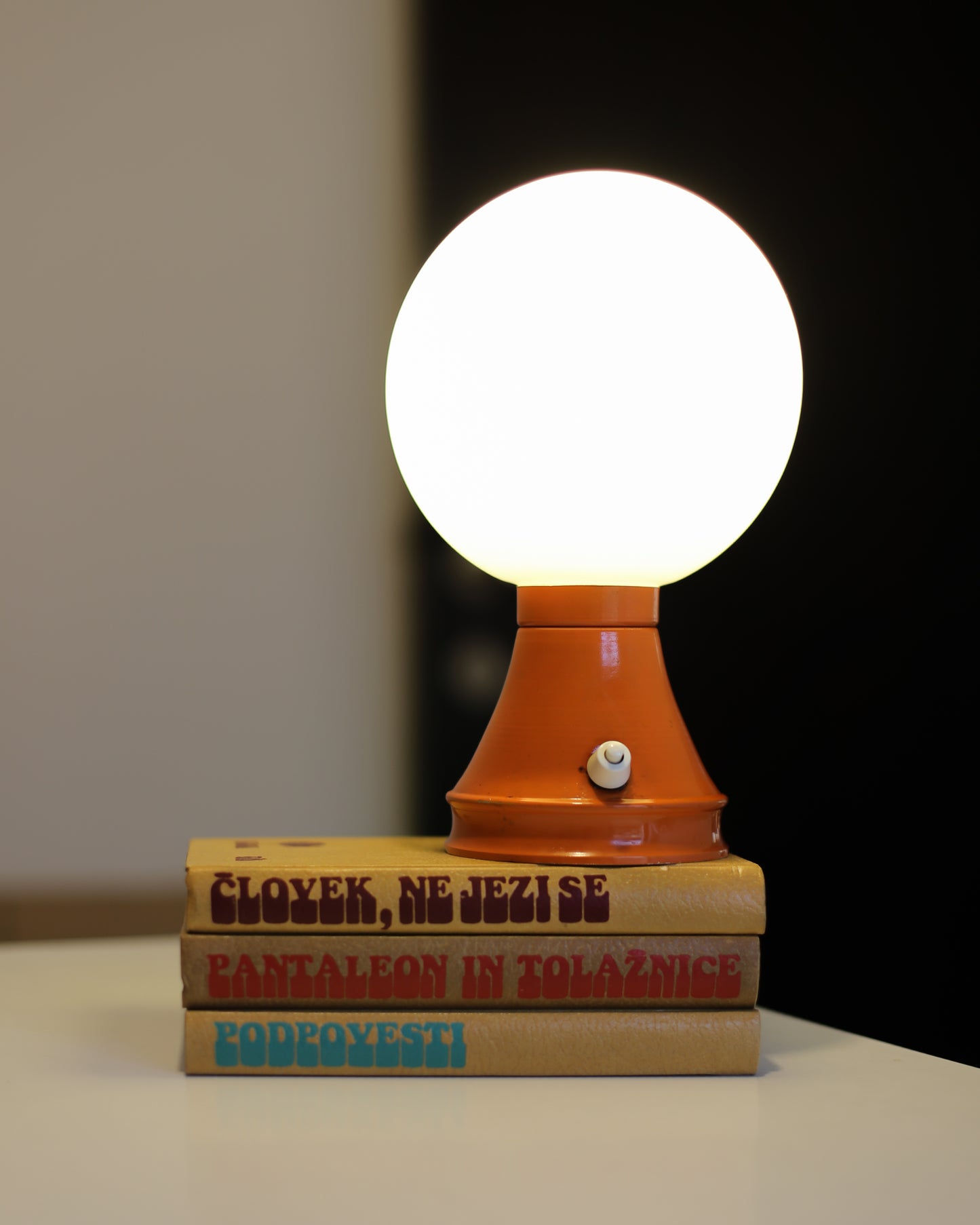 Vintage globe orange table lamp