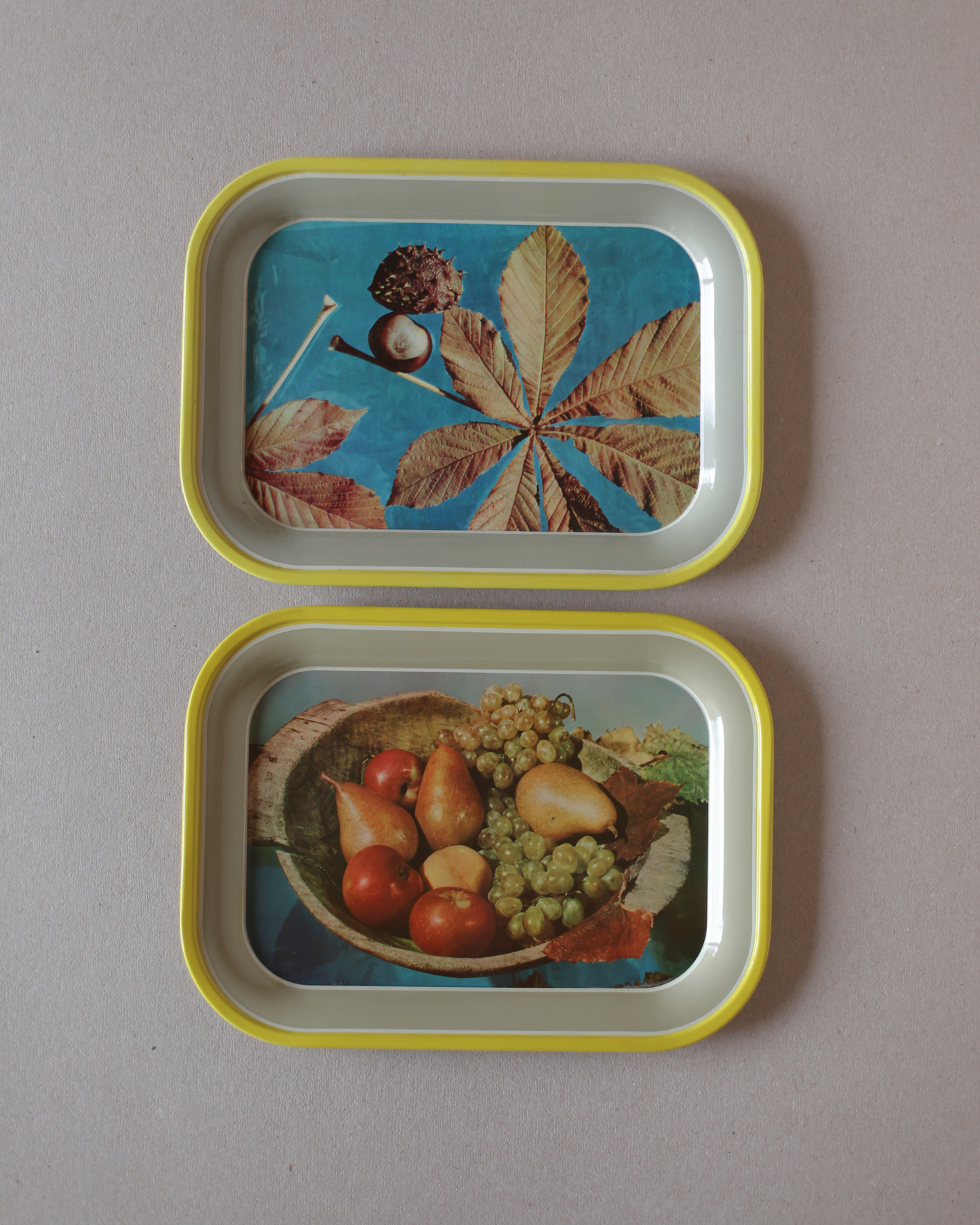 A Set of 2 Vintage Tin Trays by Saturnus