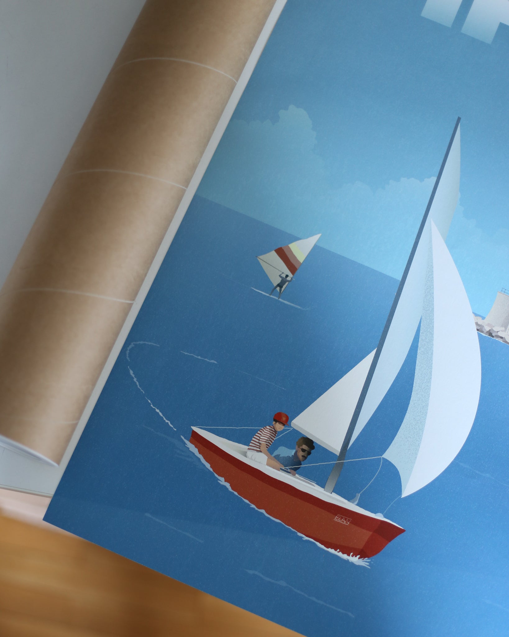 Poster of Piran, Slovenia, with a vintage sailboat Elan and coastal scene on a blue background
