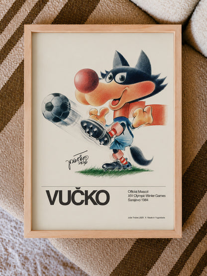 Framed poster of Vucko with a soccer ball on a striped background.